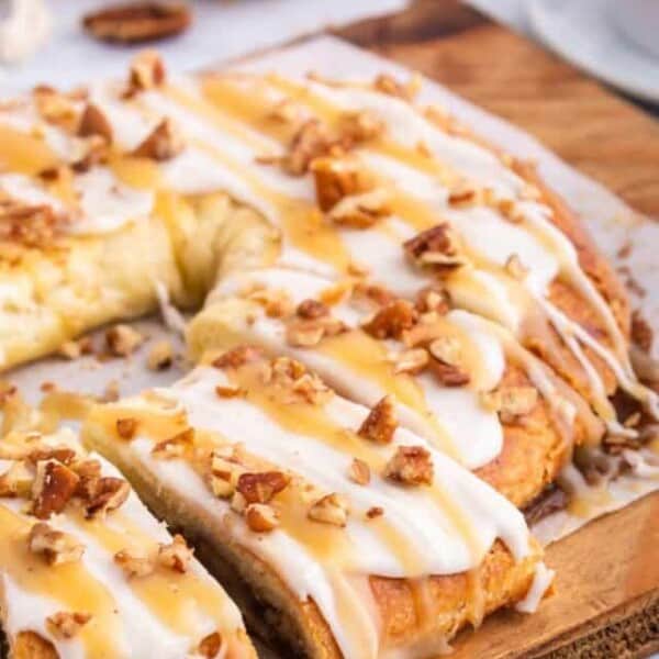 A Danish kringle on a cutting board.