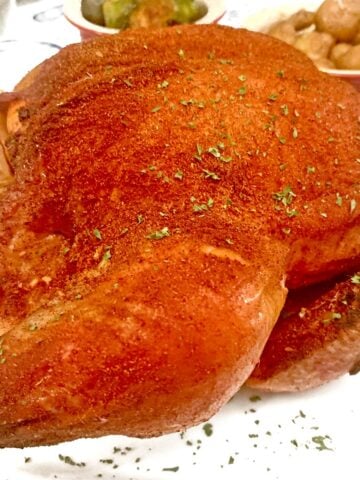 A smoked whole chicken ready to eat.