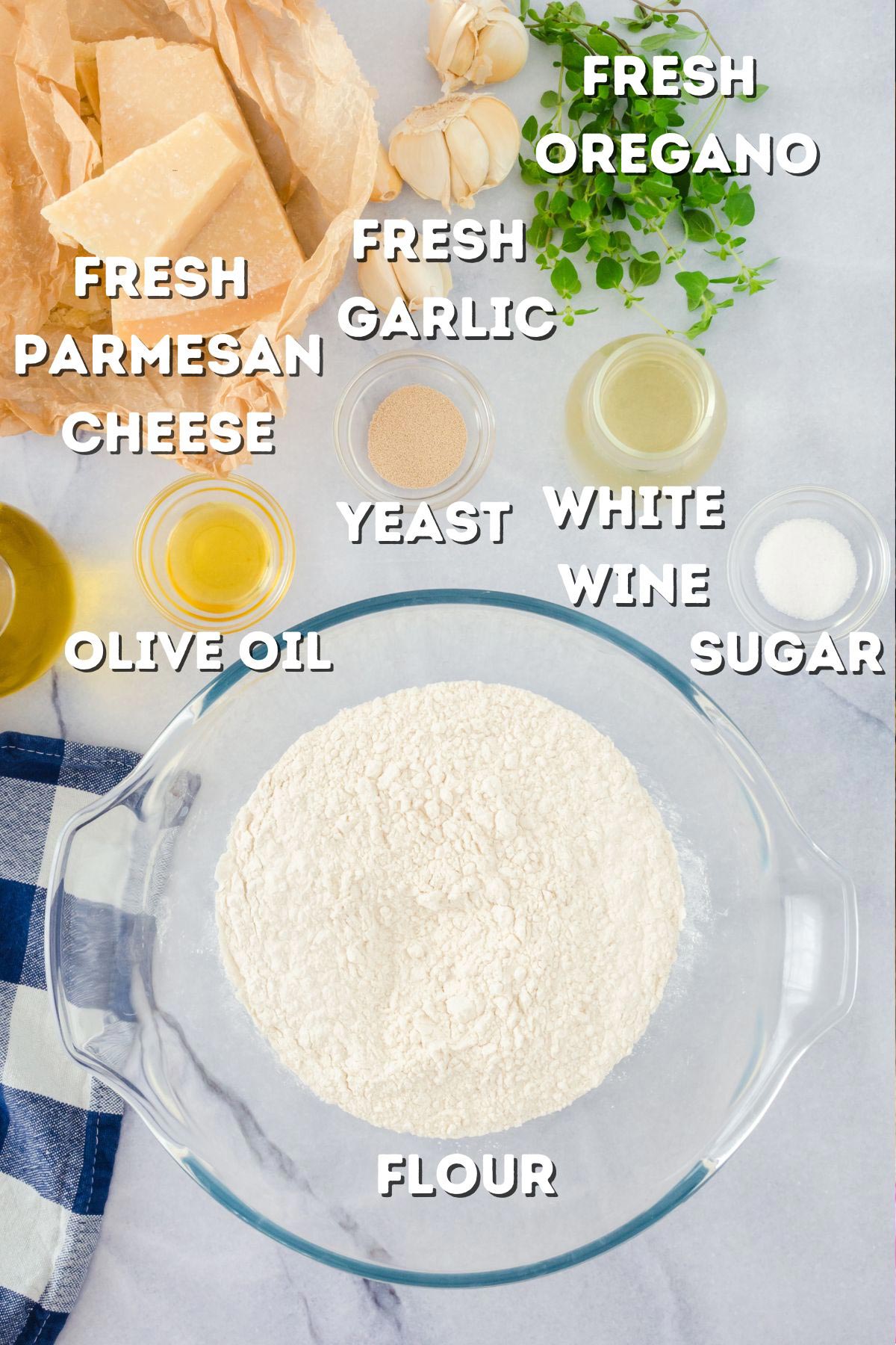 A bunch of ingredients for making a homemade pizza.
