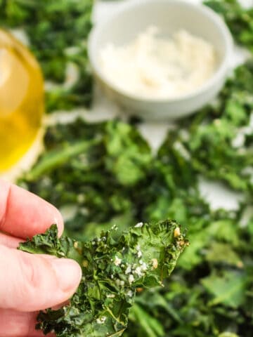 Picking up a kale chip.