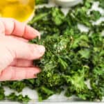 a bunch of kale chips on a baking sheet.