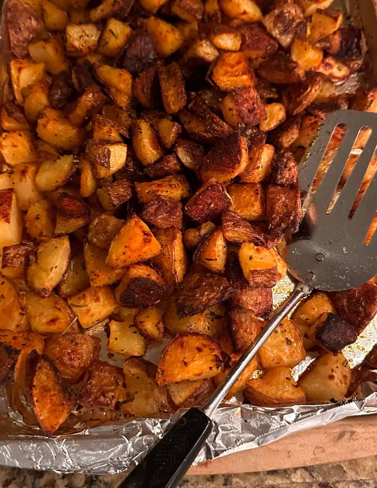 A sheet pan of roasted potatoes.
