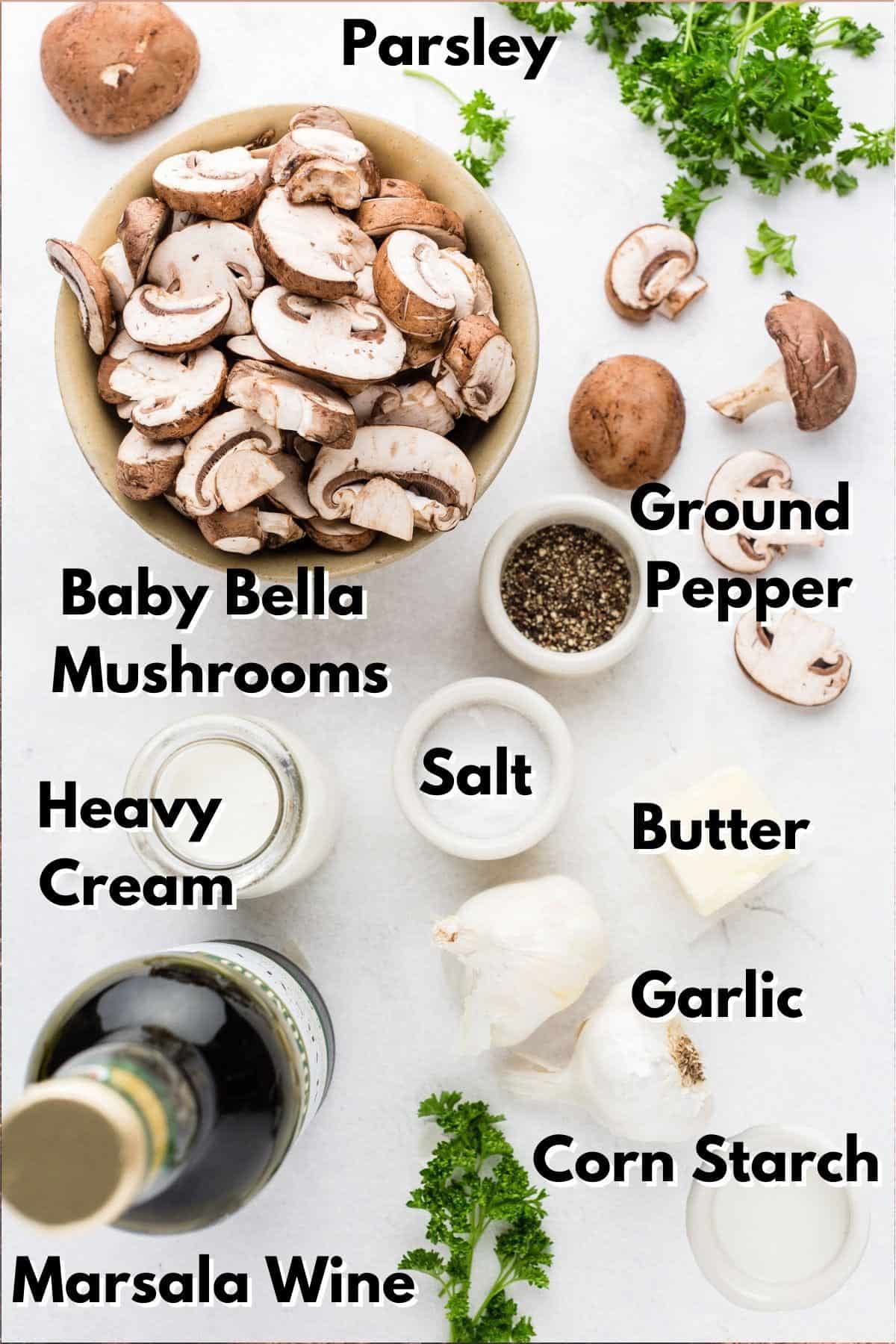 A bunch of mushrooms and other ingredients to make a sauce.