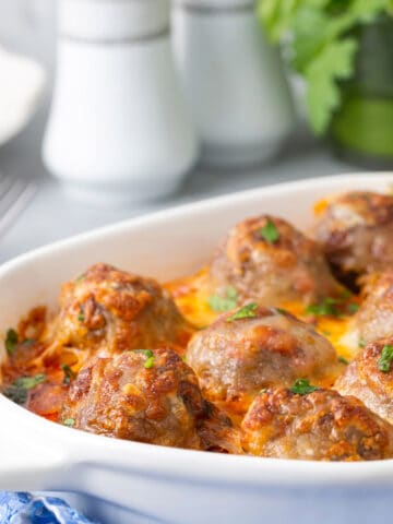 A plate of baked meatballs.