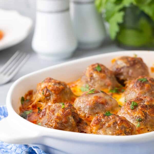 A plate of baked meatballs.