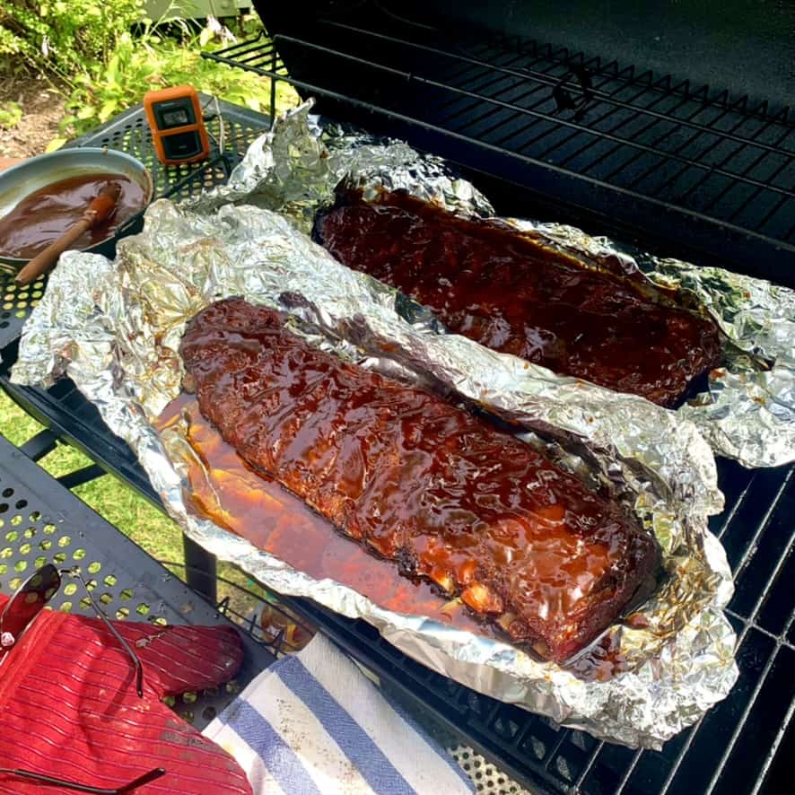 Smoking beef ribs on top of foil.