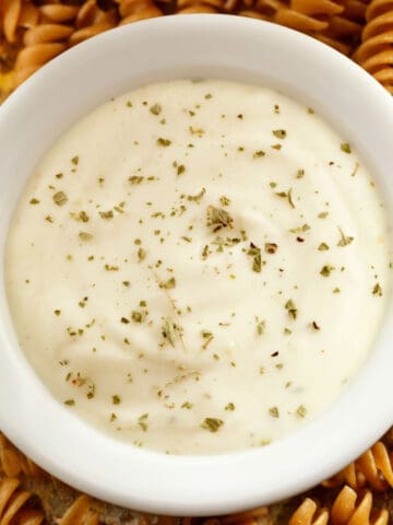 A bowl of alfredo sauce.