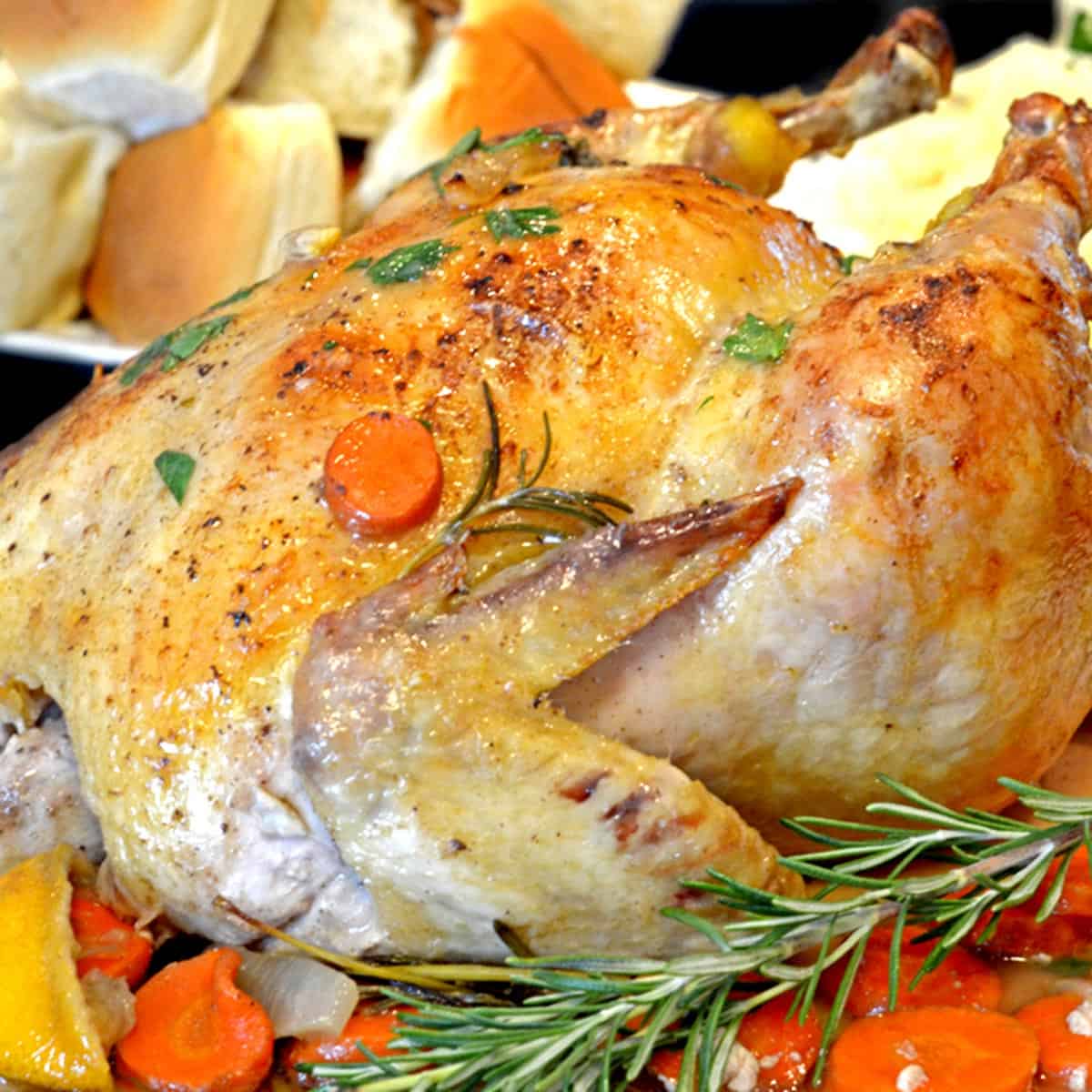 A roasted chicken with vegetables.