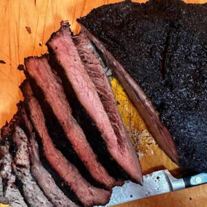 A sliced smoked brisket flat.