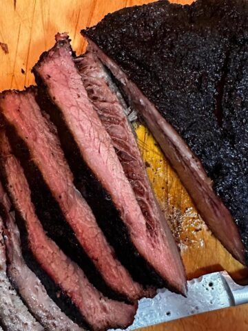 A sliced smoked brisket flat.