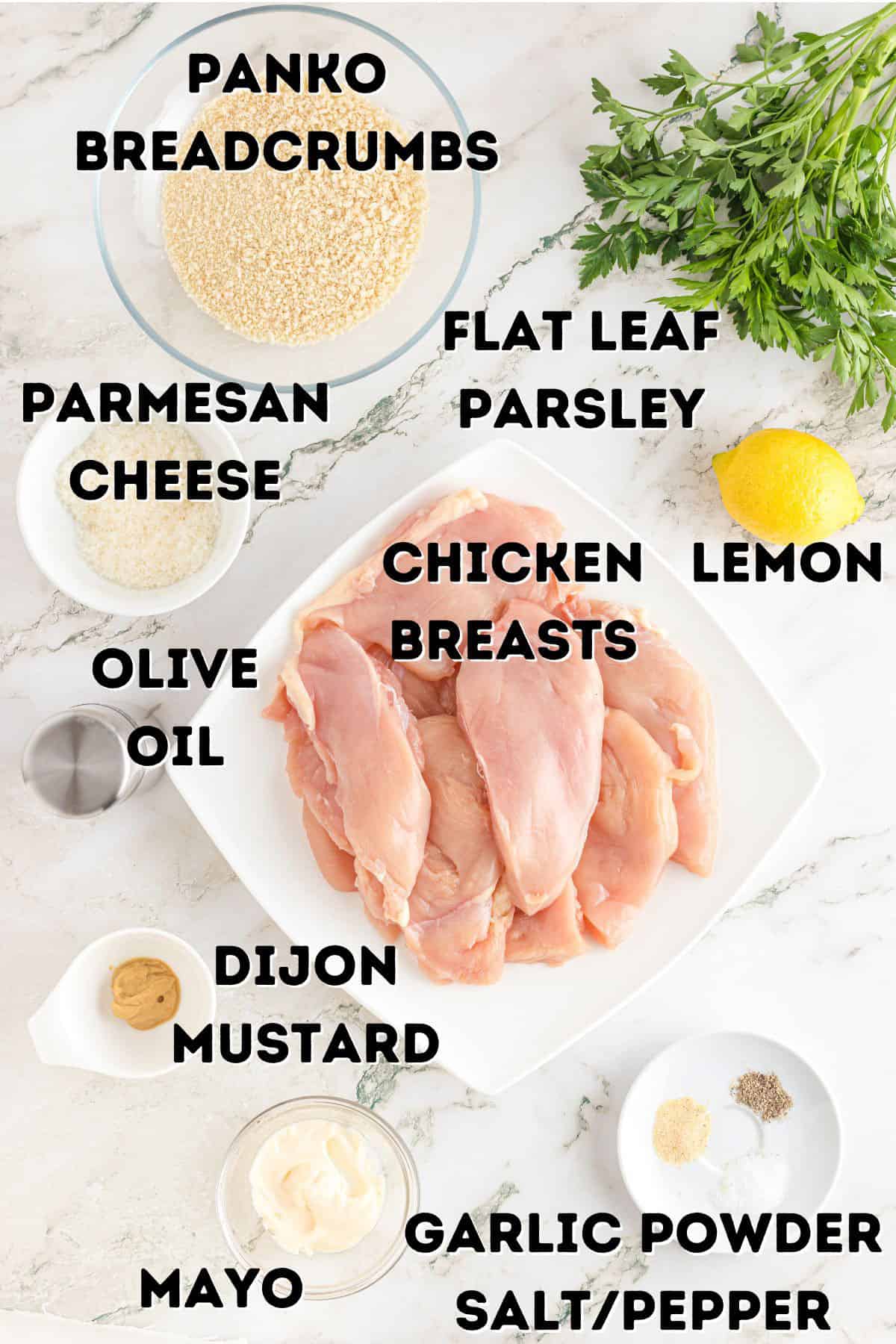 Some chicken breasts and other ingredients for making panko chicken.