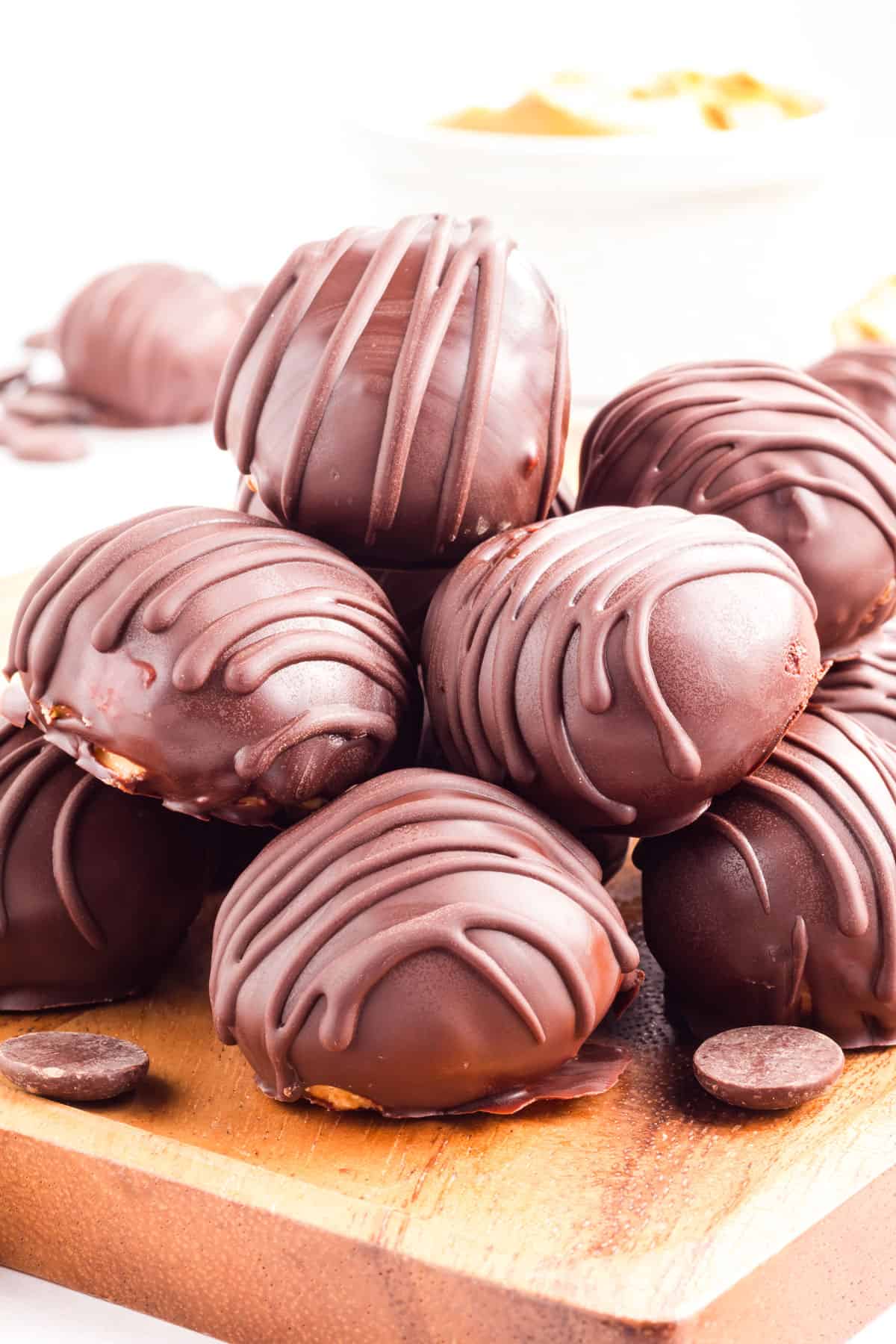 A bunch of round chocolate covered treats.