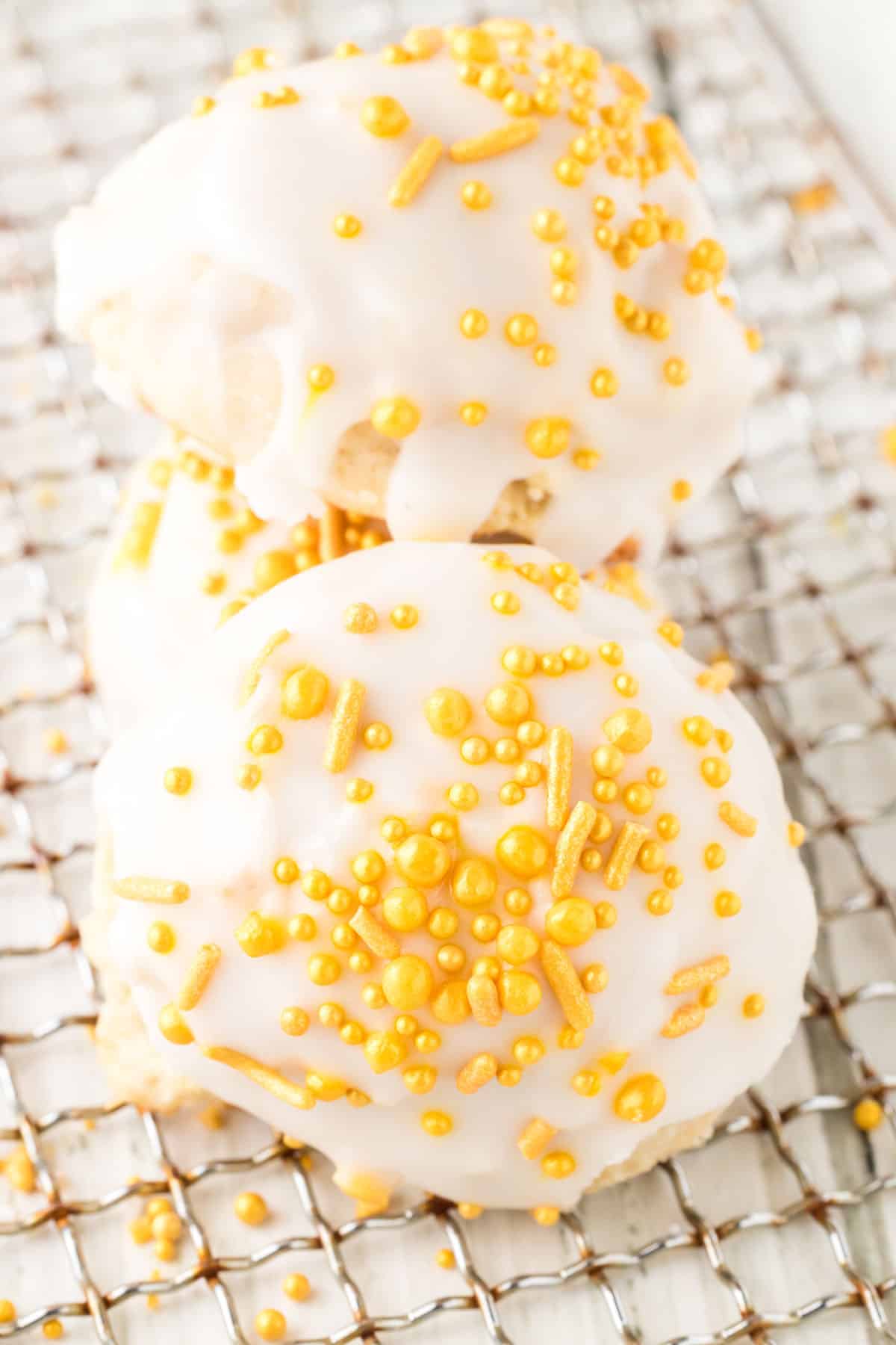 Ricatto cookies with yellow sprinkles on them.