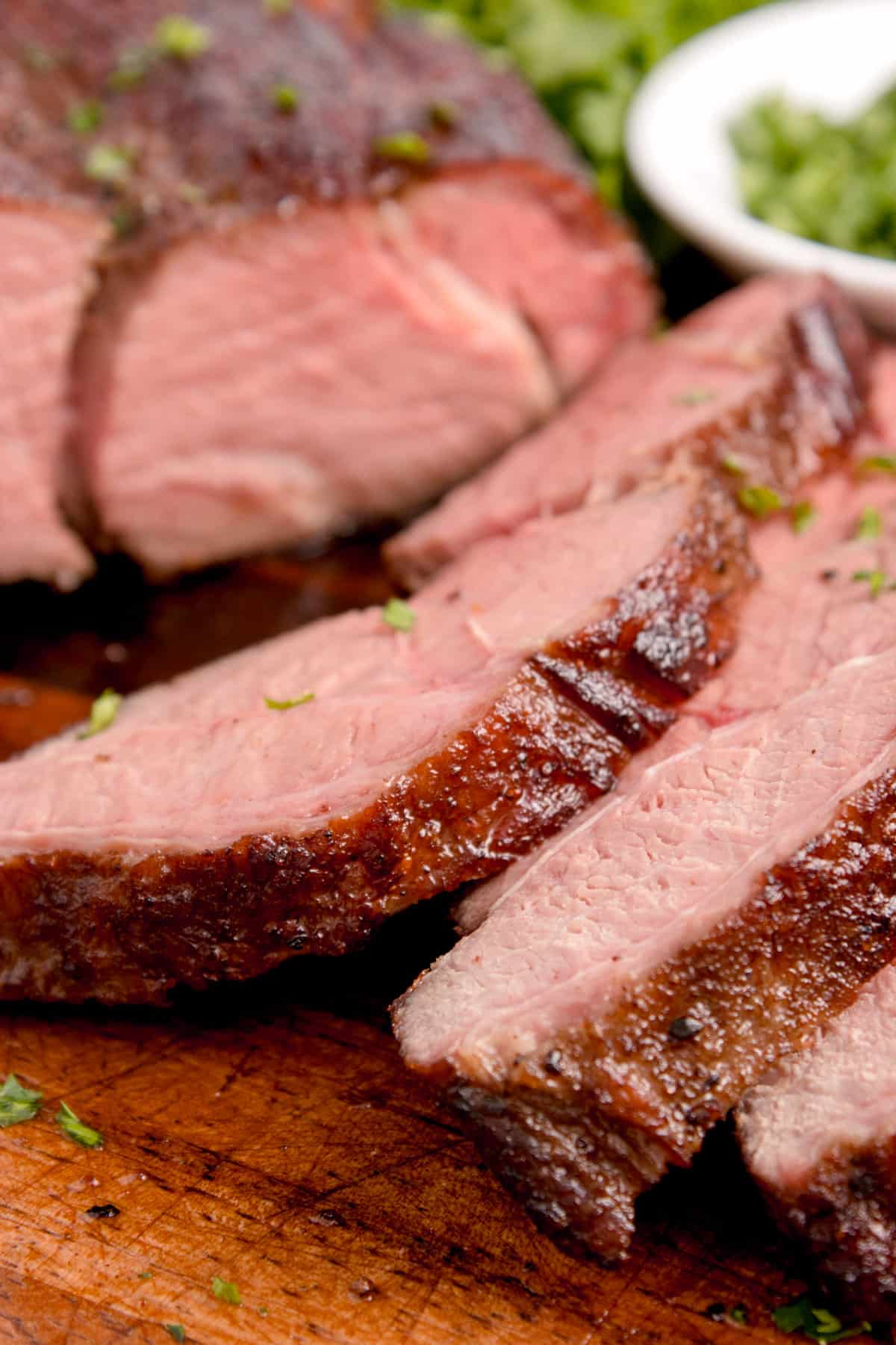 Some chuck roast sliced, medium-well and lightly pink in color.