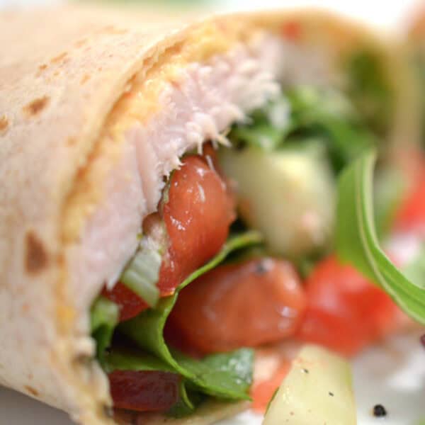 A turkey wrap cut in half.