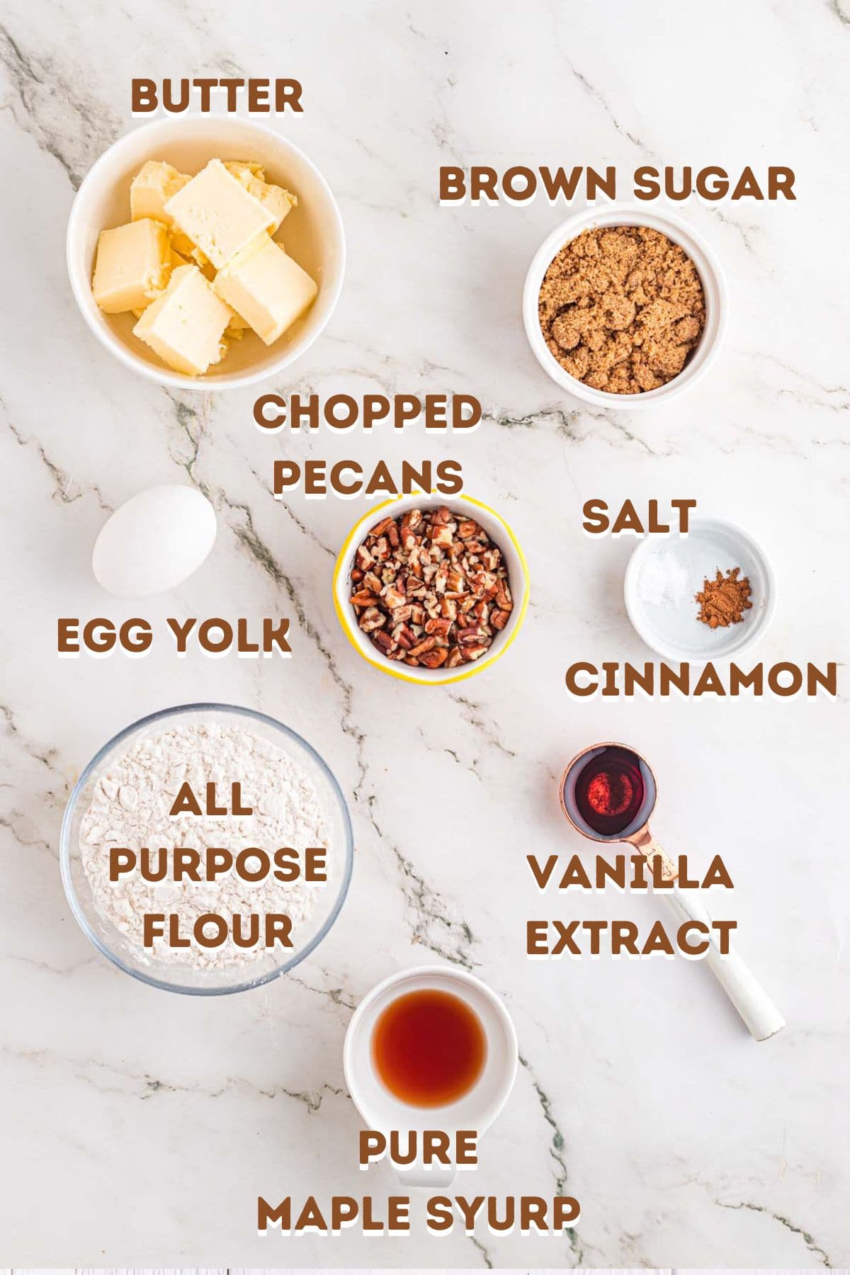 Butter, flour, brown sugar, chopped pecans, and other cookie ingredients.